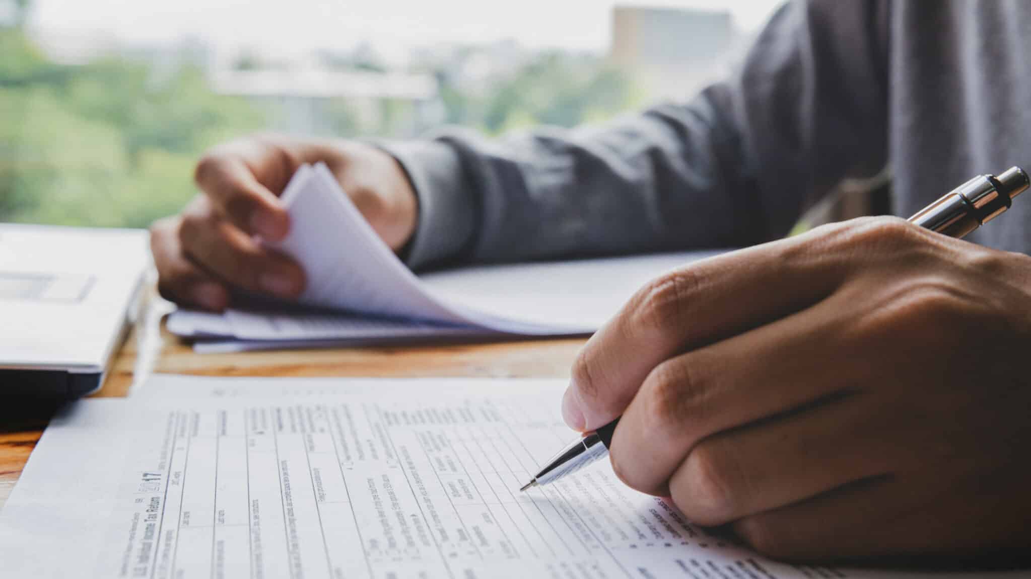 Man working on his 2023 taxes