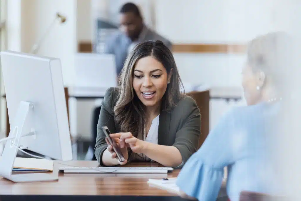 Man comparing banks, credit unions, and online savings accounts on his laptop