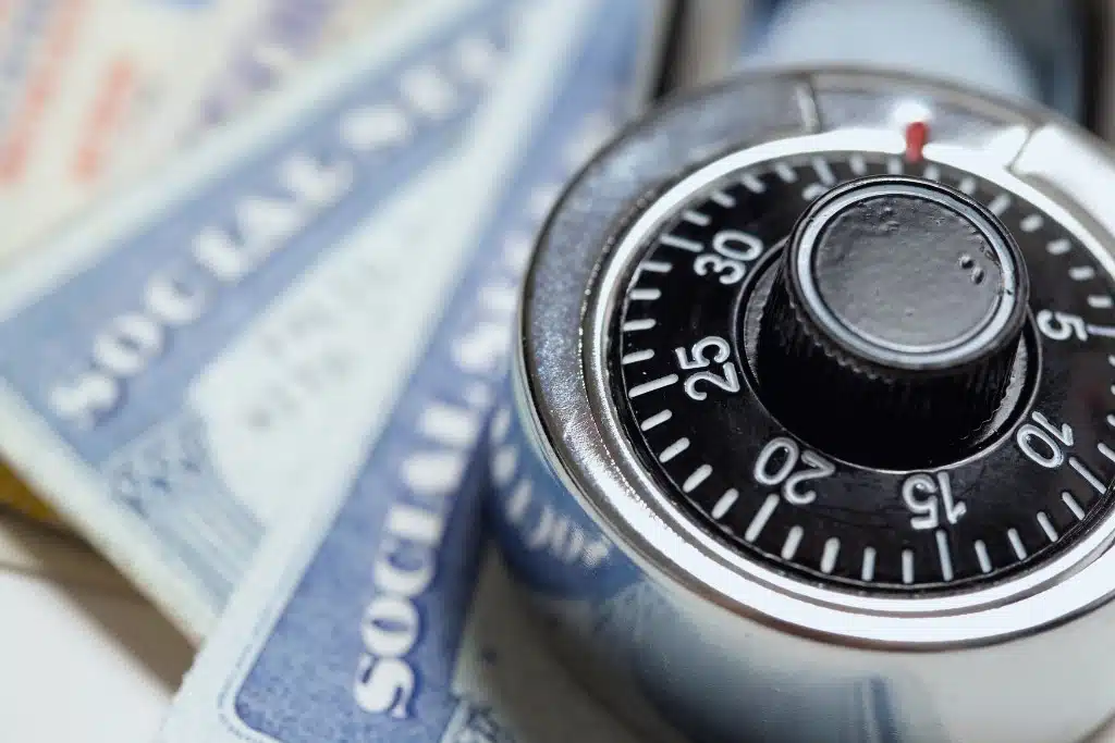 Picture of padlock on top of Social Security cards to represent ID protection